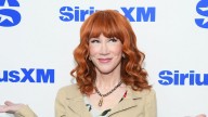 Kathy Griffin, 65, showcases svelte figure in tiny red