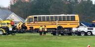 Keystone school bus overturns after getting hit by car