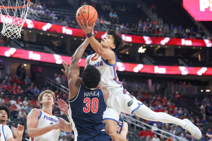 Freshman Koa Peat leads No. 13 Arizona to 93-87 win over defending champion, No. 3 Florida
