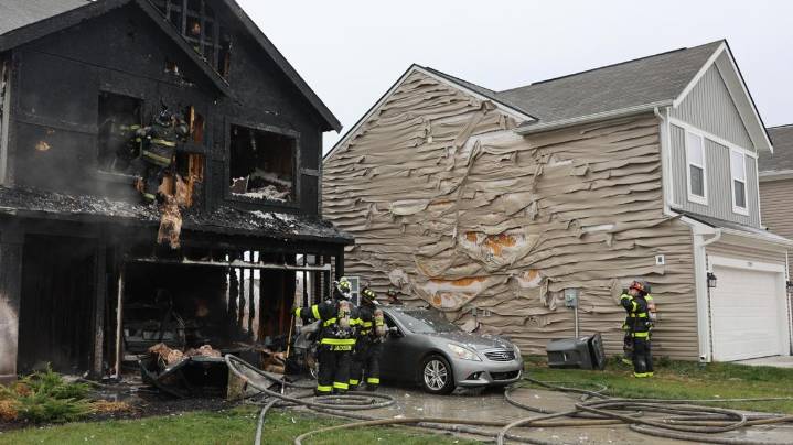 2 homes damaged, 2 families displaced, dog injured in far east Indy fire