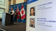 2 charged after Richmond Hill fire that killed 11
