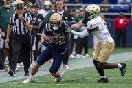Deadspin | Braxton Woodson’s two TDs in relief puts Navy past No. 24 South Florida