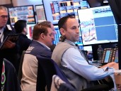 Wall Street tumbles on worries about AI stocks, interest rates