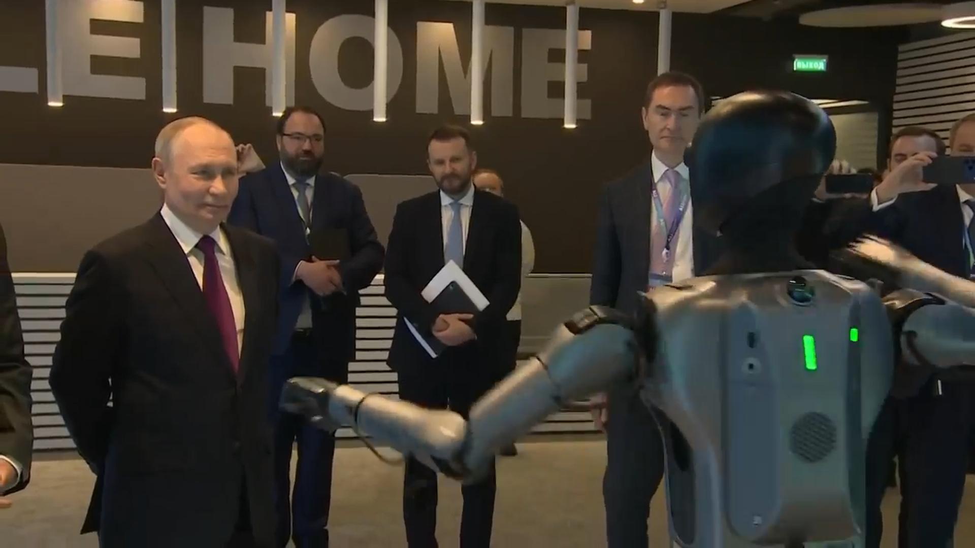 Putin on AI and building new nuclear power units after welcome from robot