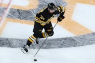 Elias Lindholm injury: Center skates, could rejoin Bruins on road trip