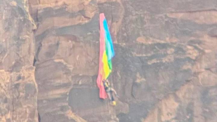 BASE jumper rescued after crashing into cliff and dangling from parachute in Utah