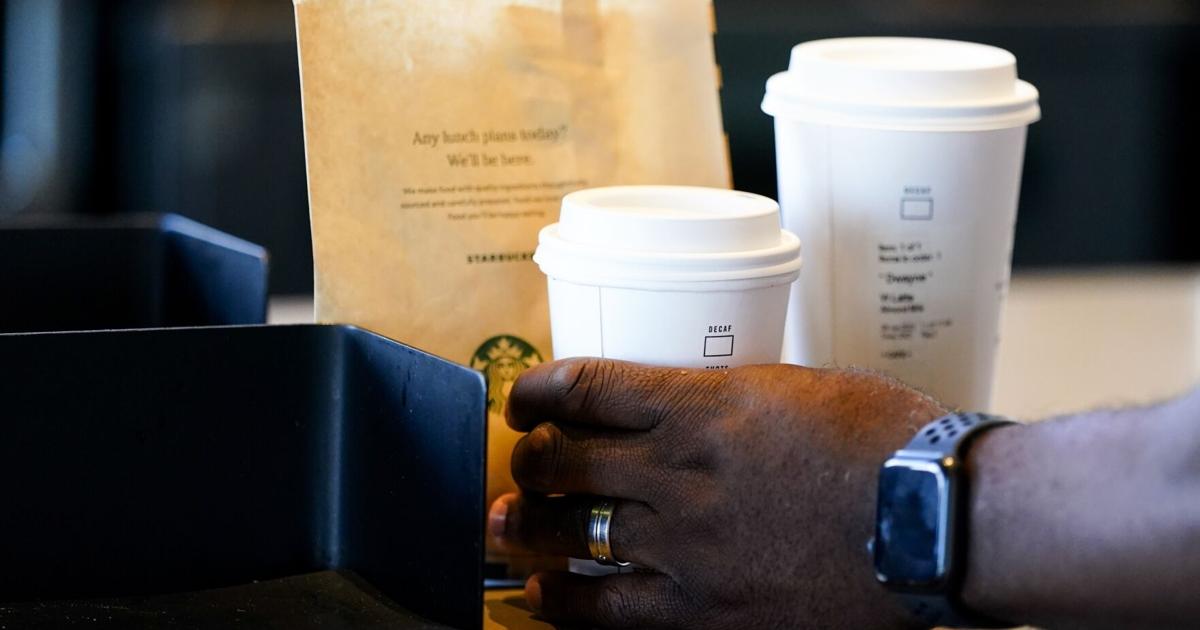 Starbucks workers kick off 65-store US strike on company's busy Red Cup Day