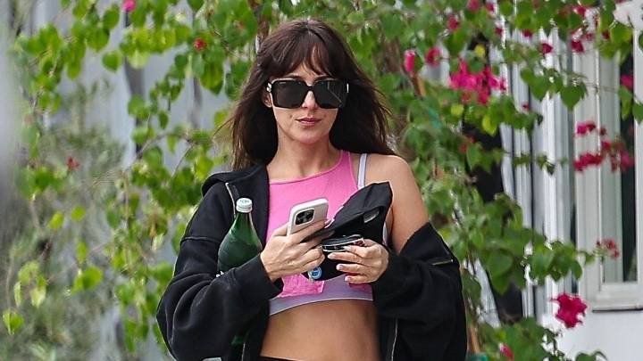 Dakota Johnson Briefly Ditches Boho for the Clean Girl Uniform