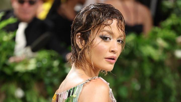 Rita Ora celebrates milestone moment in sheer plunging lace dress