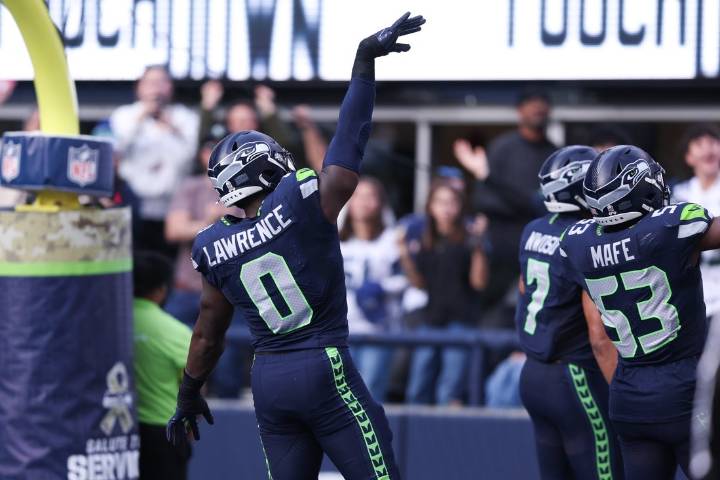 Deadspin | DeMarcus Lawrence's two TDs spurs Seahawks rout of Cardinals
