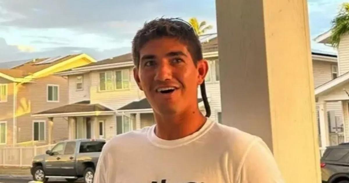 Horror as shark mauls lifeguard spilling 'big red stain' in water on beach