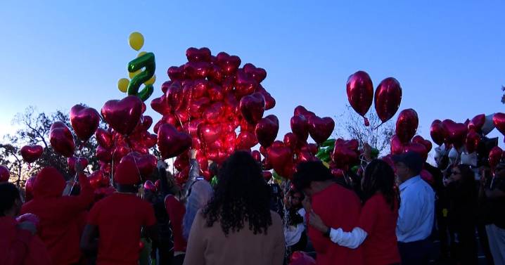 Erik Spencer's family and friends release balloons to celebrate his life