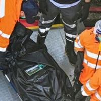 'Tormenting': Relatives search through images of the dead after Hong Kong blaze