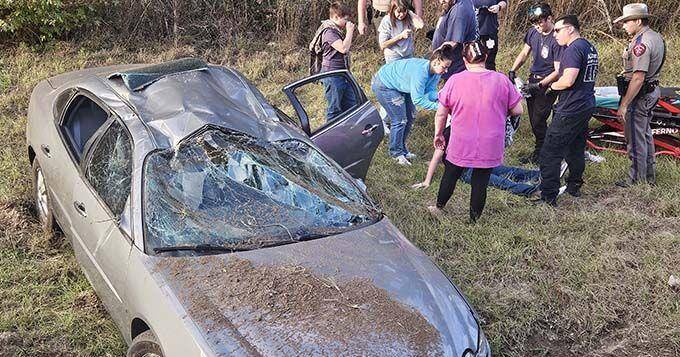 Car leaves road and lands in ditch injuring driver