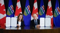 Canada's prime minister and Alberta's premier sign pipeline deal that could reverse oil tanker ban