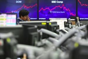 Asian markets sink as tech bubble fears grow