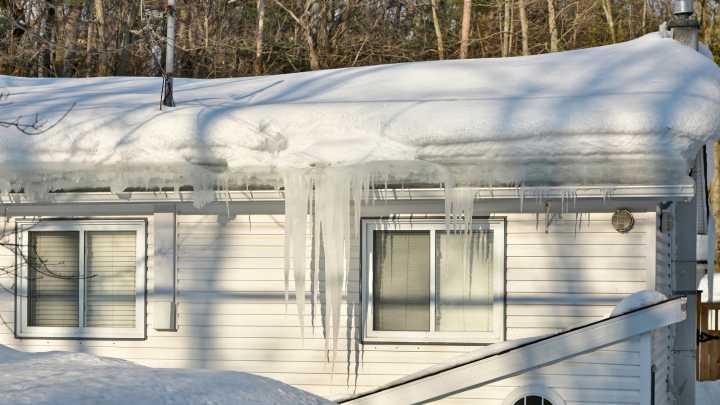 The Stocking Hack That Can Help Remove Ice From Gutters