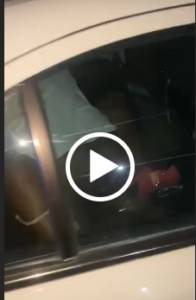 Scandal As A Couple Is Bursted DOING IT At The Back Of A Car (Watch Video)
