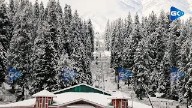 Tourists mesmerised as fresh snow blankets Gulmarg in Kashmir