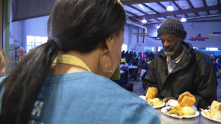 Homeless Alliance holiday lunch feeds hundreds, special guest brings gifts of warmth