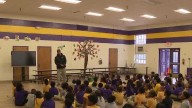 Former UofL star Josh Minkins Jr. leads Thanksgiving giveaway at West End School