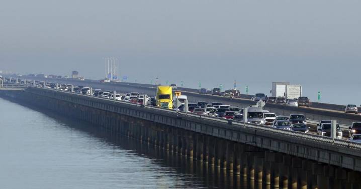 Rolling convoys deployed on the Lake Pontchartrain Causeway during heavy fog
