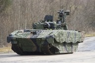 Army pauses use of Ajax fighting vehicles for two weeks after soldiers fall ill