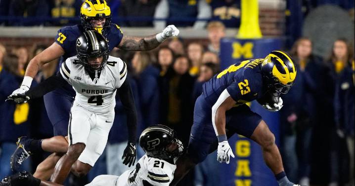 No. 21 Michigan holds off Purdue