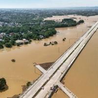 Philippines digs out from Typhoon Fung-wong as death toll climbs to 18