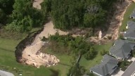 Evacuated Mount Dora residents to return home as ravine is filled