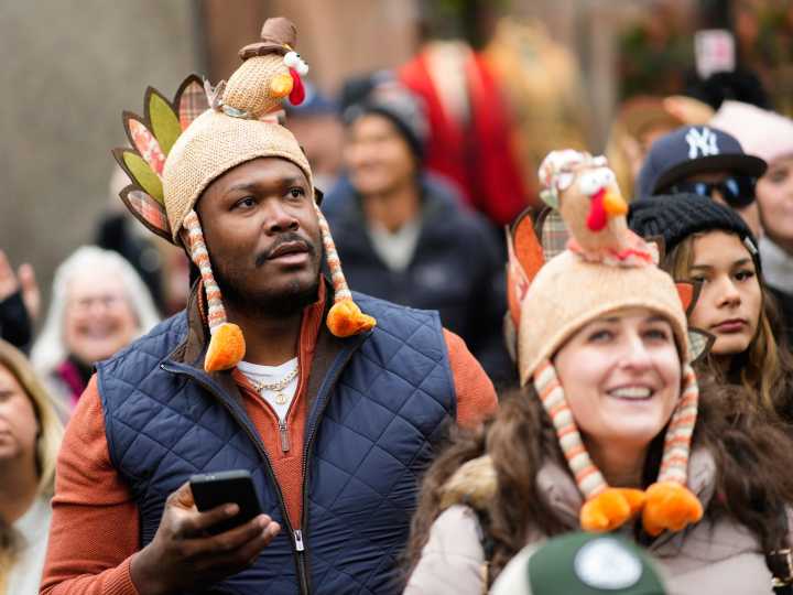 In the US, the Macy’s Thanksgiving Day Parade marches on despite wind gusts