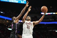 Short-handed Cavs rally to beat Heat 130-116 behind Jarrett Allen's double