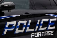 Train hits semitruck in Portage, blocking traffic