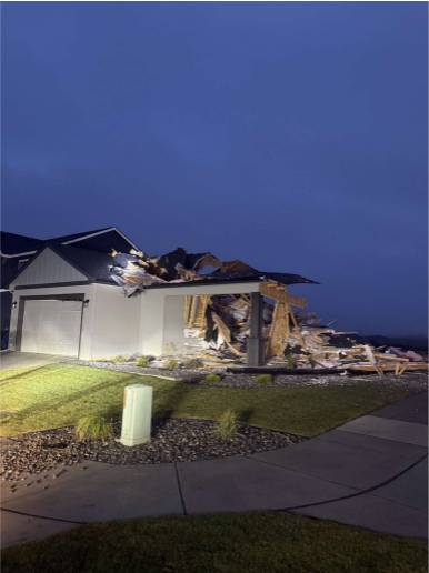 Man in custody for destroying a house with an excavator, Post Falls police say