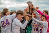 Photo Gallery of the MHSAA Division 2 boys soccer state finals match between Warren De La Salle and Hudsonville Unity Christian
