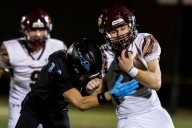 Poquoson hangs on with late touchdown, defensive stand to beat Armstrong for region title