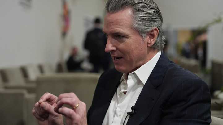 Newsom tells AP the eight senators who struck the shutdown deal aren't alarmed enough about Trump