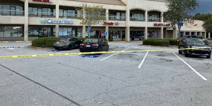 Man shot while sitting in car at DeKalb shopping center