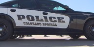 CSPD: Woman allegedly kicks officer, tries to kick out windows of police cruiser during arrest