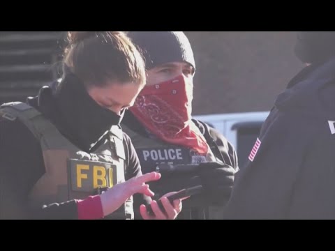 DOJ sues California over federal officer mask ban