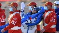 Chinese astronauts land safely after debris-damaged capsule forces delayed return