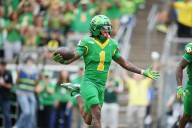 Receiver Dakorien Moore out for Oregon against Iowa