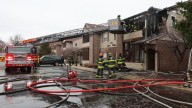 Thanksgiving day apartment fire on Indy's south side displaces 11 people, injures firefighter