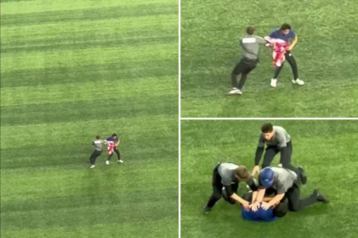 Fan runs onto field with American flag to delay World Series Game 6
