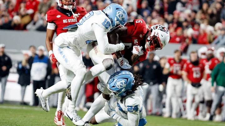 Wilson runs for 4 TDs as NC State beats UNC 42-19, winning rivalry game for 5th straight year