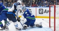 Morrissey's three points power Winnipeg Jets to 5-3 victory over Vancouver Canucks