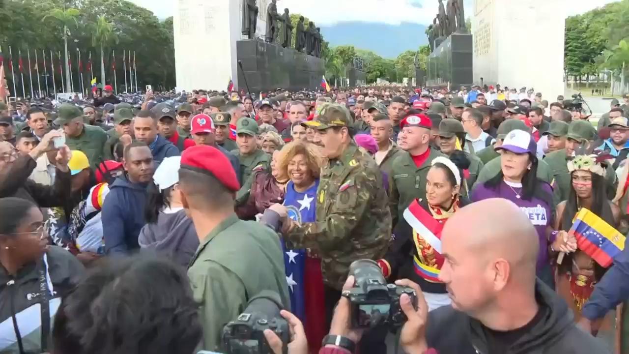Supporters of President Nicolás Maduro march in Venezuela amid tensions with the US