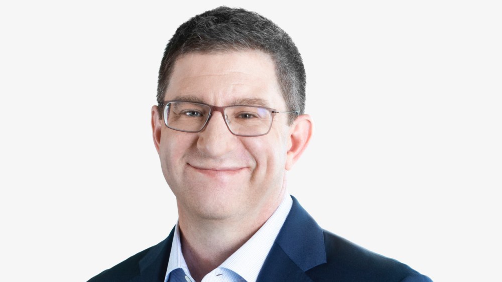 PVH CFO Zac Coughlin is Stepping Down In Move to SiriusXM