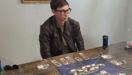 Man Torn Between Learning New Board Game Or Getting PhD In Quantum Physics