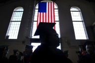 Public workers could be denied loan forgiveness if cities defy Trump, lawsuit alleges